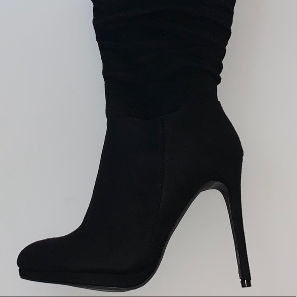 Over the knee black boots